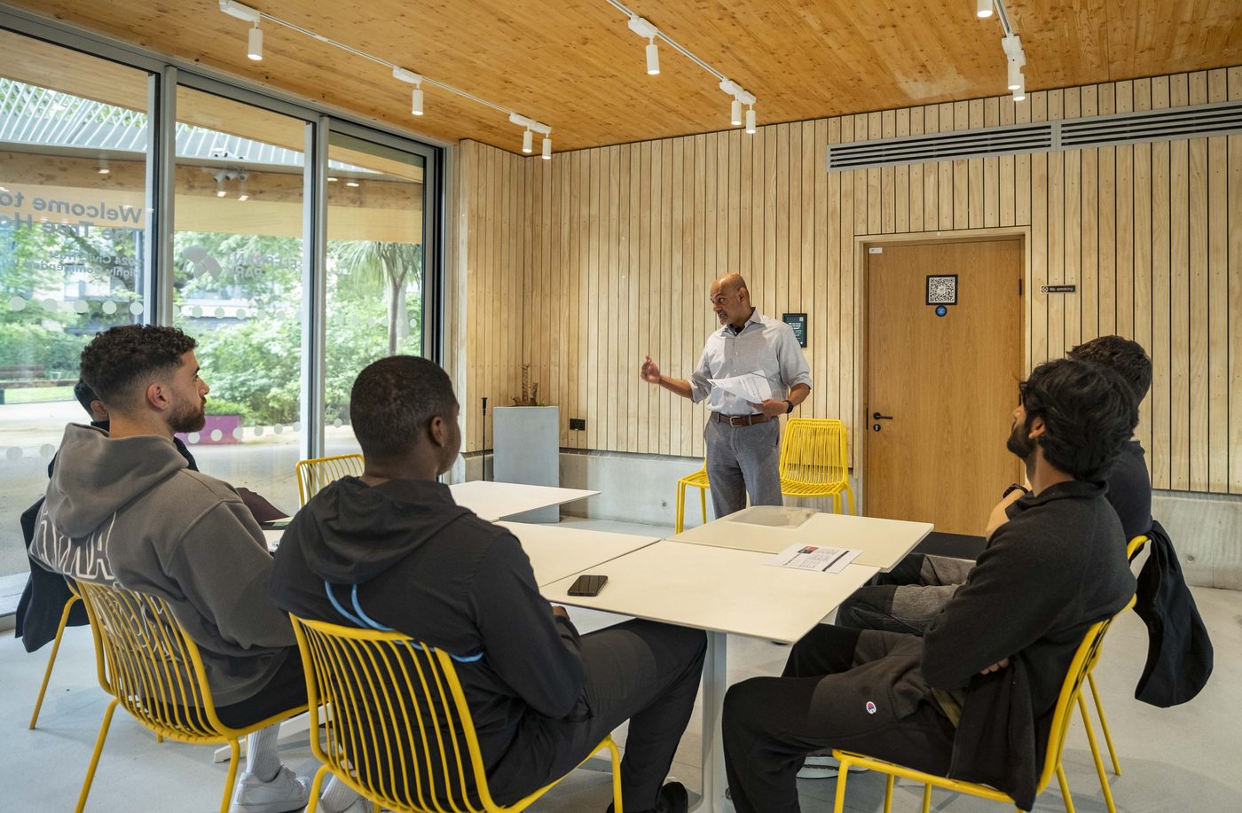 Attendees at a find your point financial education session at The Tree House, London